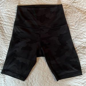 8” size 4 deep coal camo bike shorts. Worn twice no pilling or fading.